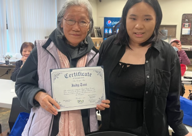Resident pictured with her Cantonese language instructor.