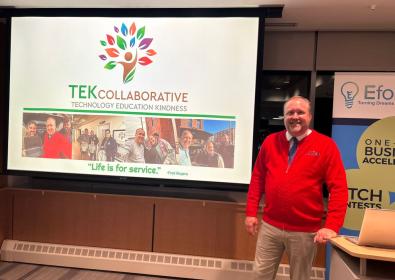 TEK Collaborative Founder and Director Jeff Williams pictured in front of projector.